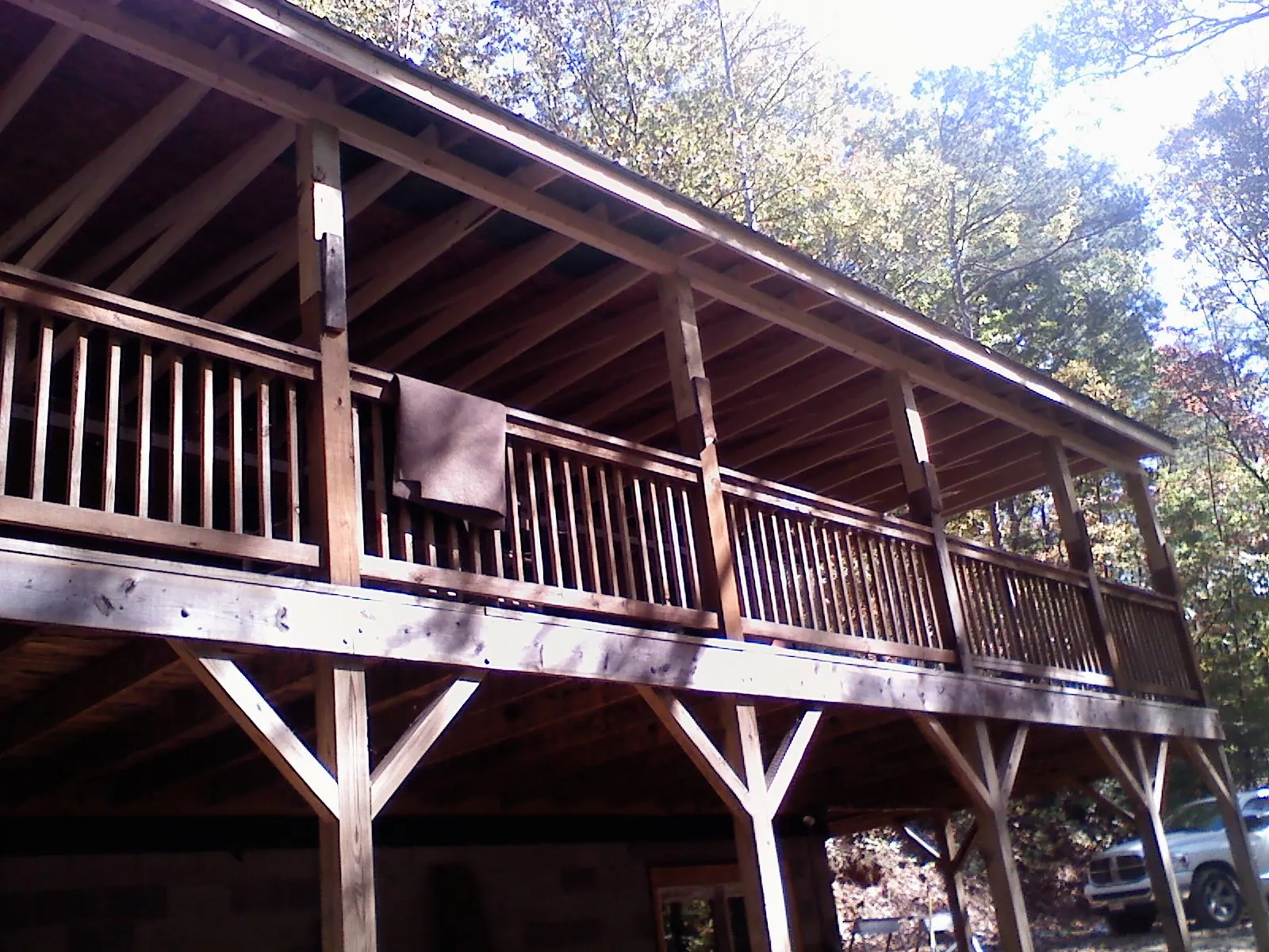 Timber framing under a new elevated porch and deck — Roof Leak Repair in Country Club Hills by Roofing Brothers